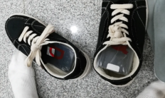 两人脚踩8部iPhone进境 因步伐僵硬被发现